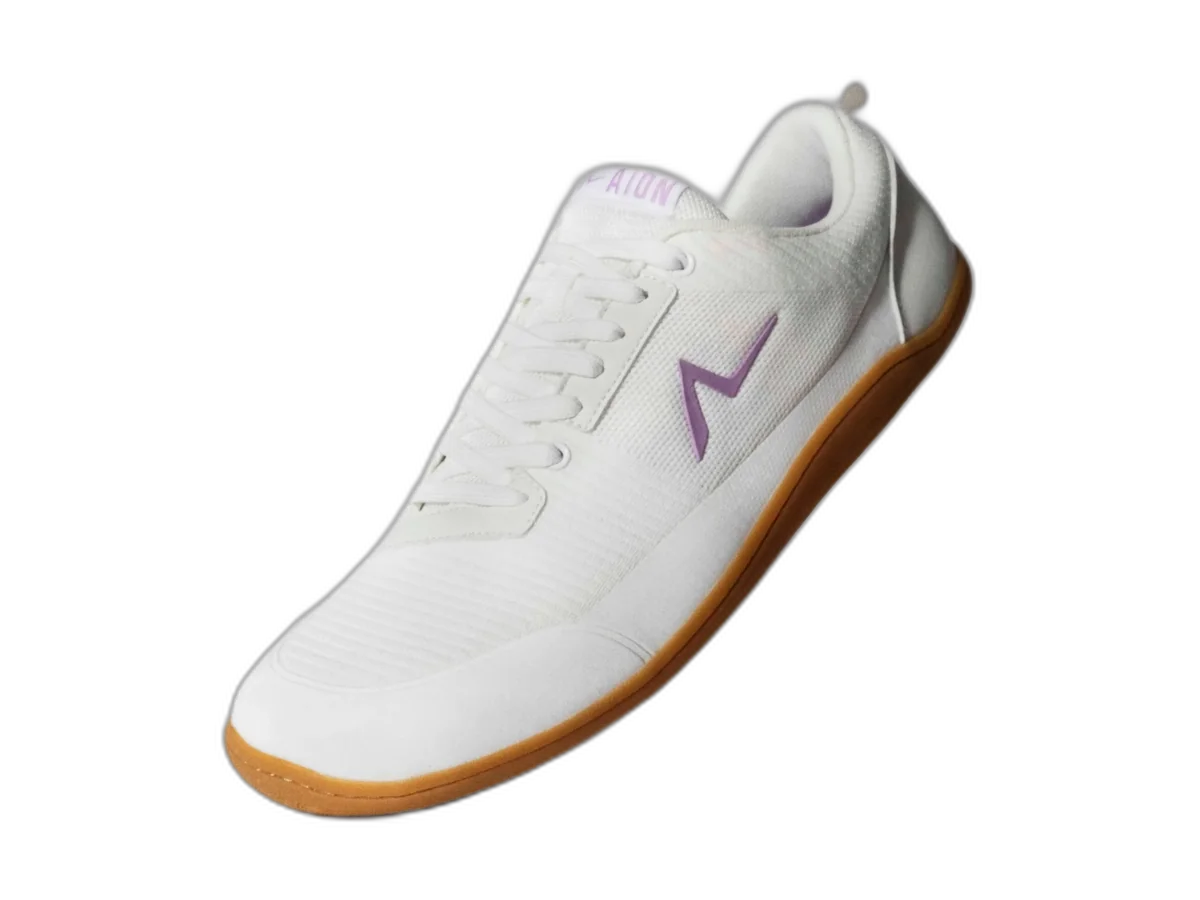 White Aion Trainer Dailys barefoot-style shoe with a gum outsole on a transparent background