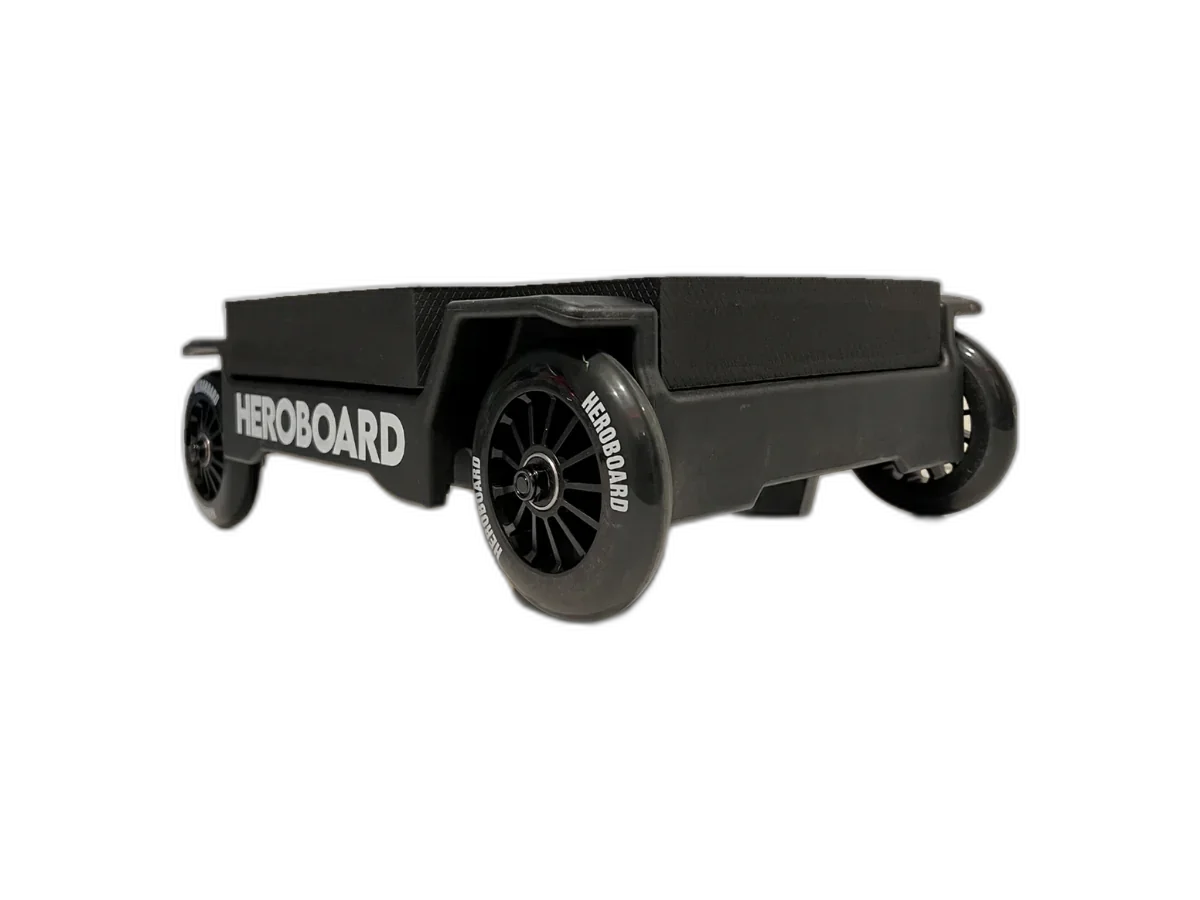 Black HEROBOARD Pilates platform with wheeled gliders, isolated on a transparent background