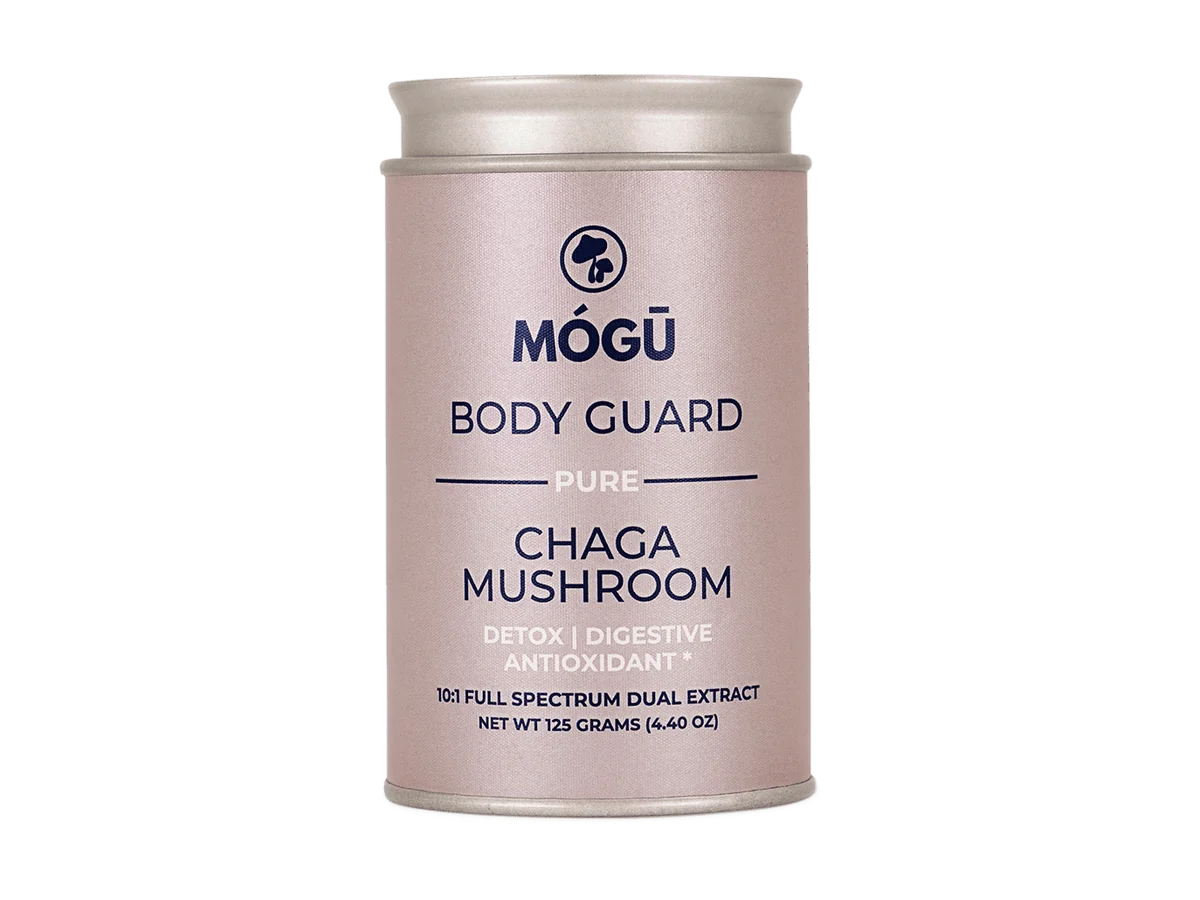 Mógū Organic Chaga powder canister shown upright against a transparent background.