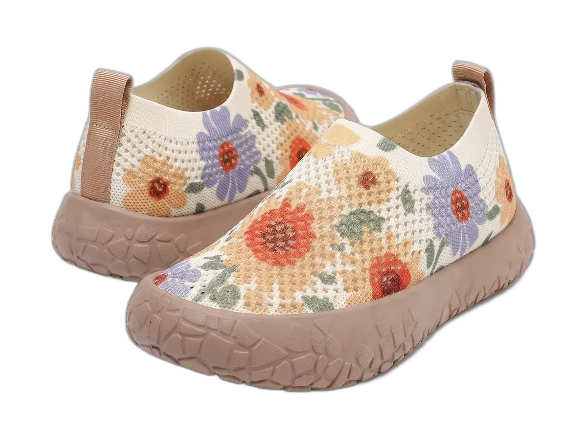 Pair of Nimbao Cloud Step knit slip-on shoes in a floral print.