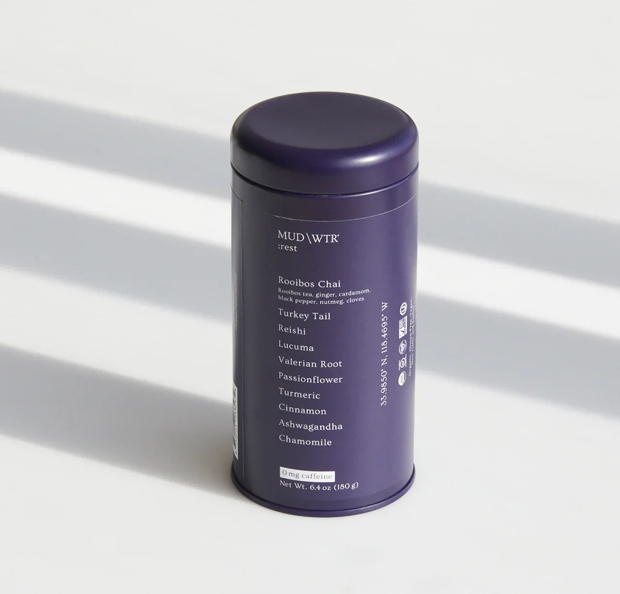 Purple MUD/WTR Rest tin photographed on a white background.