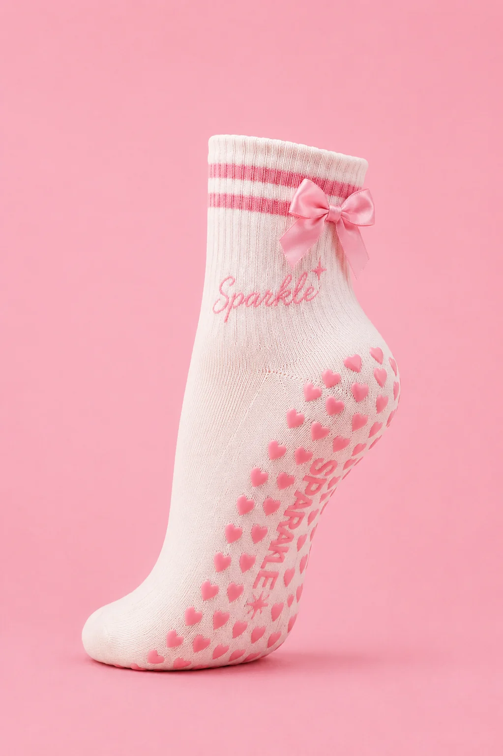 Sparkle Fitness Pretty In Pink Pilates sock with bow and heart-shaped sole details.