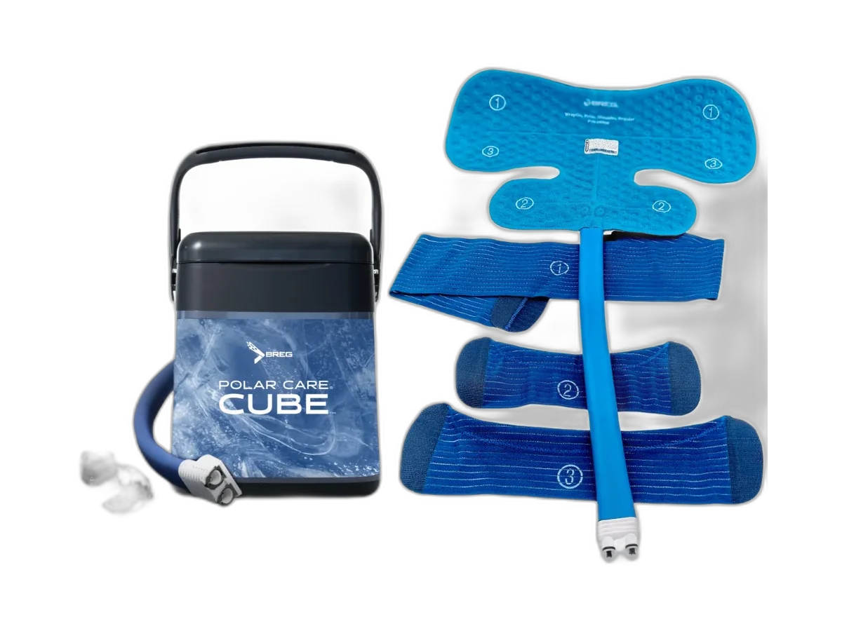 Breg Polar Care Cube cooler and blue Multi-Use XL Wrap-On pad on a transparent background